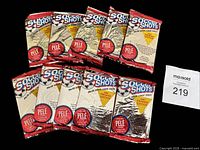 Ten sealed Soccer Shots foil packs laid out, showing fronts