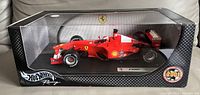 Front angled view of sealed Hot Wheels Ferrari F2001 model in box