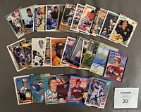 All 25 signed baseball cards laid out