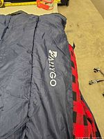 Logo side of navy exterior showing brand marking