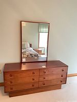 Front view of dresser with mirror