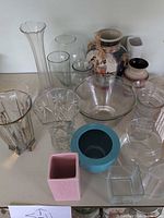 Group shot showing majority of vases, bowls, planters