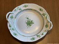 Top view of the Herend Chinese Bouquet Green porcelain serving platter showing full design and handles