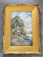 Frontal view of the signed late 19th-century watercolour landscape in gilt frame