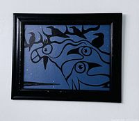 Front view of framed acrylic painting showing twin ravens motif against blue background