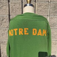 Back view showing yellow flock "NOTRE DAM" lettering