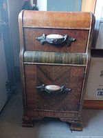 Full view of nightstand showing drawer, door, and overall design