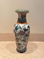 Full front view of vase showing overall form and decoration