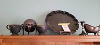Full lot on shelf showing all six silverplate pieces