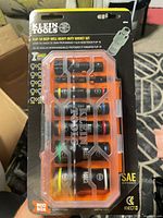 Front of sealed Klein Tools Flip-10 socket set package showing sockets in orange case