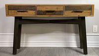 Front view showing full console table, drawers, legs