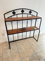 Front view of metal and wood bakers rack
