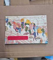Front of illustrated slipcase showing title and artwork