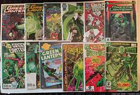 All 12 Green Lantern comics laid out in two rows