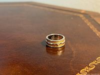 Full view of ring standing upright