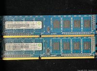 Front of both RAM modules showing labels: Ramaxel 4GB 1Rx8 PC3L-12800U-11-11-A1, Lenovo OEM code, chip layout
