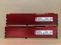 Front view of two HyperX Fury DDR3 modules showing labels and gold contacts
