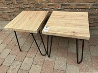 Both side tables top view against brick wall