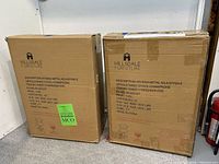 Two sealed Hillsdale Furniture stool boxes