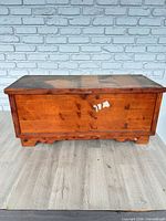Front view of cedar chest showing missing finish