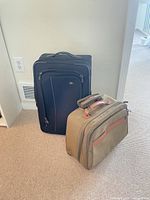 Carry-on suitcase and briefcase front view