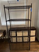 Full view of black six-shelf wire unit front