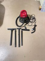 Coleman canister vacuum, hose, extension tubes, brush heads