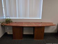 Front view of marble console table against wall