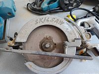 Front view of Skilsaw circular saw showing blade and guard