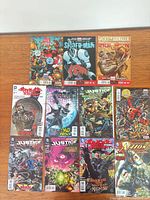 Group shot of all 11 comic books laid out