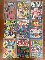 All nine comics bagged and boarded laid out