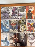 overview of all 12 Moon Knight comic issues laid out in two rows