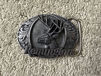 Front view showing deer head relief, Remington logo, overall design