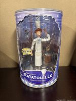 Front view of boxed Linguini figure with accessories visible