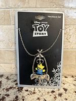 Necklace on Toy Story card showing full chain and pendant
