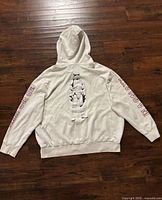 Back view of hoodie showing Stormtrooper graphic and sleeve text