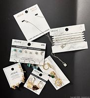 All six Ardene jewelry items on cards