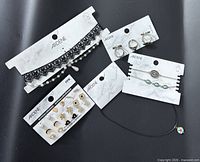 Overview of five Ardene carded jewellery sets