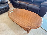 Top view showing oval shape and veneer grain