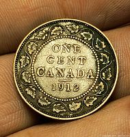 Reverse view showing ONE CENT CANADA 1912 and maple-leaf wreath