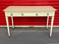 Front view of Hespeler French provincial desk showing overall structure and drawer
