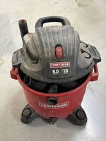 Full view of Craftsman vacuum showing brand markings, capacity and horsepower labels