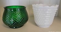 Both glass planters side by side for size and color comparison