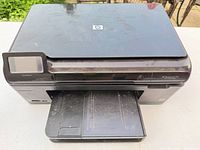 Top view of HP Photosmart Plus B209a printer showing overall condition
