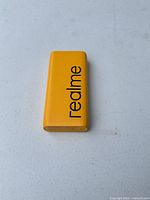 Top view showing yellow body with realme logo