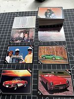 Stack of Corvette trading cards with several sample fronts displayed