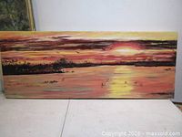 Full view of large horizontal sunset painting on canvas