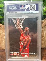 Michael Jordan side of PSA-slabbed card, cert 52477779 visible