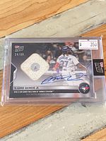Front view of encased 2022 Topps NOW Vladimir Guerrero Jr. autographed relic card