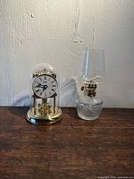 Clock and lamp side by side for scale and item count